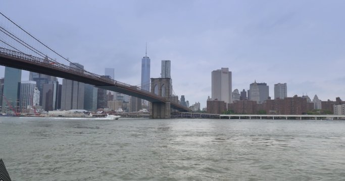 The New York City skyline on a cloudy day as seen from Brooklyn.	