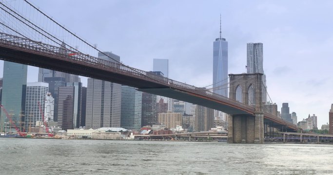 The New York City skyline on a cloudy day as seen from Brooklyn.	