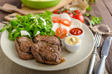 Beef steak with salad