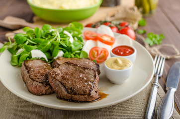 Beef steak with salad