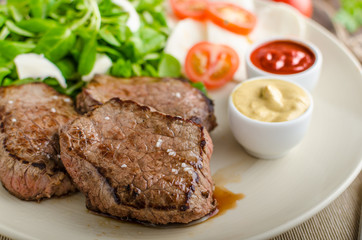 Beef steak with salad