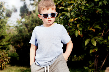 Small boy in sunglasses. © neonshot