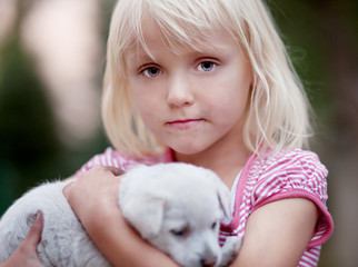 Little girl with dog.