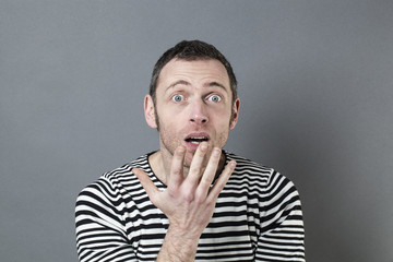 disturbed 40s man acting surprised