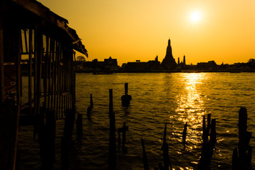 Silhouette of Wat Arun Temple during sunset