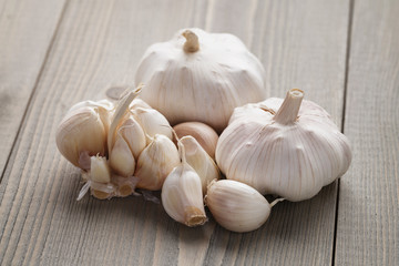 garlic on wooden table closeup