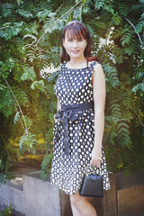 Beautiful woman in retro style dress