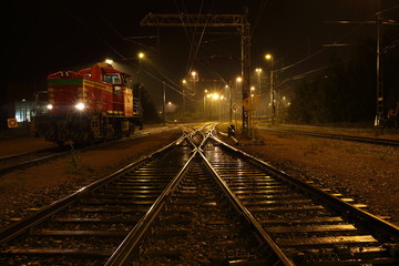 Diesel engine. Railway at night.