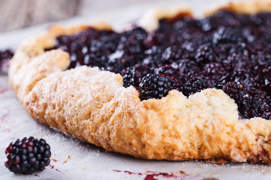 Galette with blackberries.selective focus