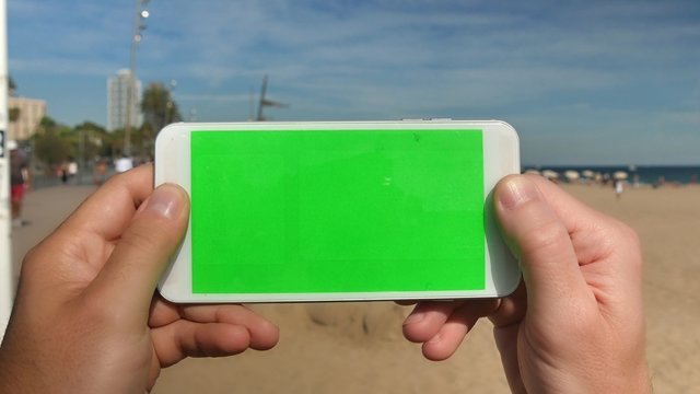 4K Green Screen Smartphone at the Beach
