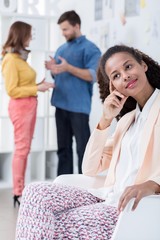 Afroamerican businesswoman resting in office
