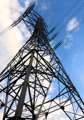 High-voltage tower   and blue sky background.