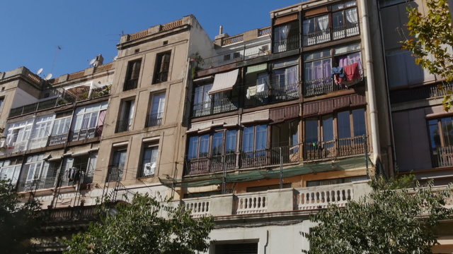 A generic Spanish-style residential building establishing shot.