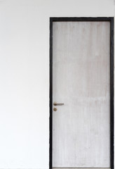 wood door with concrete wall