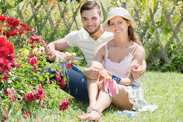 Fototapeta premium Married couple resting at the garden