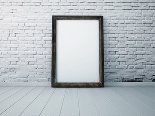 Poster in a black frame standing on the floor in the interior. mock up