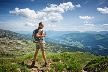 Female Hiker Giving Thumbs Up on Trail Summit