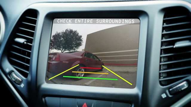 5393 A car's backup camera in action. Fictional screen content.	