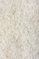 Cuisine and Food, Background of Uncooked White Long Rice, Basmati Rice or Jasmine Rice.