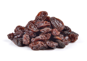 Dried raisins on a white background
