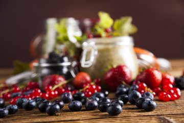 Fresh berries and wild berry jam