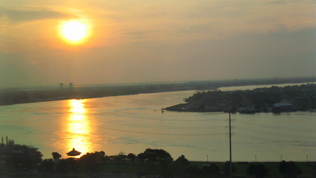 Mississippi River Sunrise Time-Lapse. A time-lapse of the sun rising over the Mississippi River delta, south of the crescent that marks the city of New Orleans.