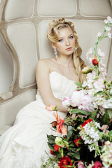 beauty young bride alone in luxury vintage interior with a lot