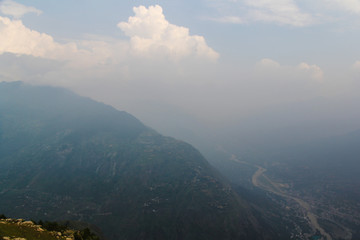 Majestic mountains landscape under morning sky with clouds. 