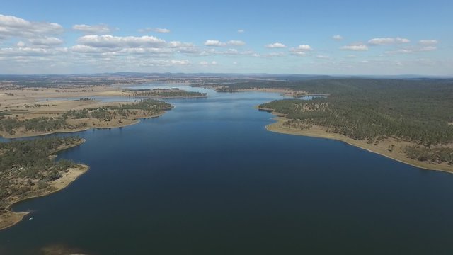 Aerial view stock video footage view of joh Bjelke-Petersen freshwater Dam in regional queensland australia. Drinking water reservoir