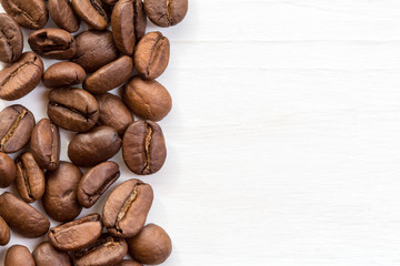 Coffee bean border on wood surface