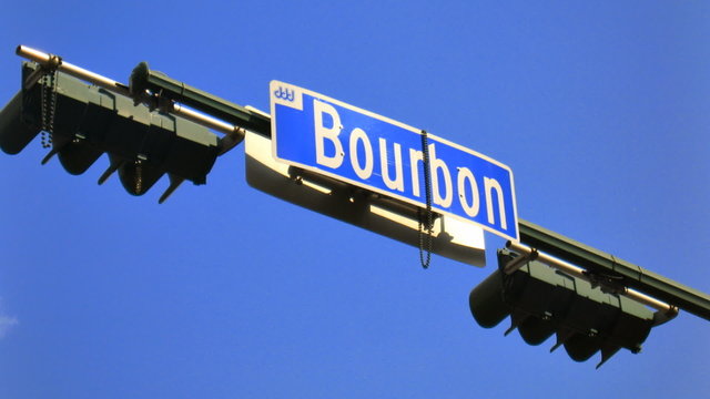 Bourbon Street Sign Time-Lapse. The Bourbon Street sign at Canal Street in the French Quarter area of New Orleans.