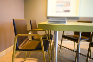 Colorful decoration reading zone in my home (chairs, book, table, cable plugs)