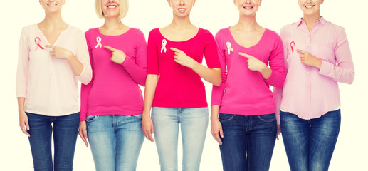 Fototapeta na wymiar close up of women with cancer awareness ribbons