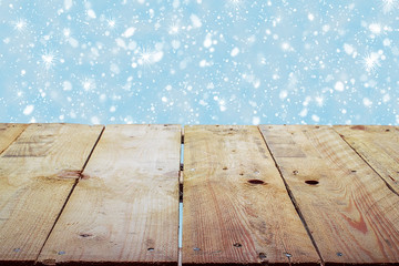 Christmas holiday background with empty wooden deck table
