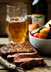 flank steak  with tomato salad.