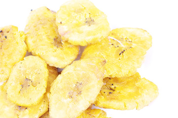 Fried platanos closeup on white