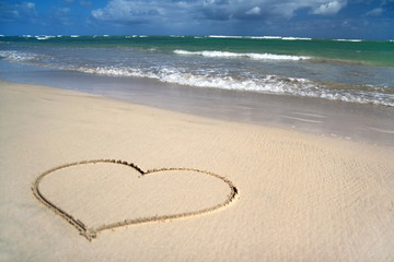 Valentines heart on sand of beach
