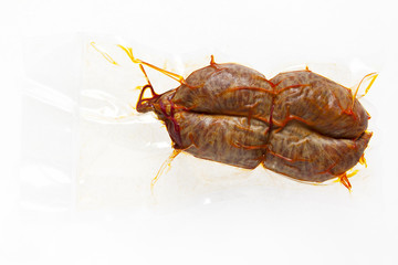 Soppressata . Italian dry salami. overpacked in a plastic bag an