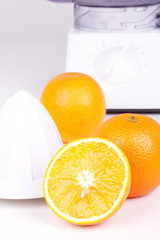 Squeezer and three oranges