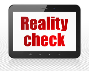 Finance concept: Tablet Pc Computer with Reality Check
