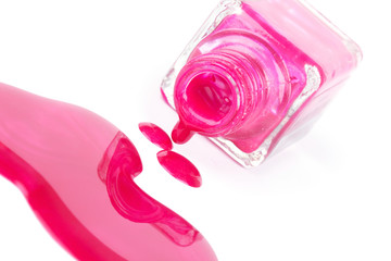 Spilled pink nail polish on white