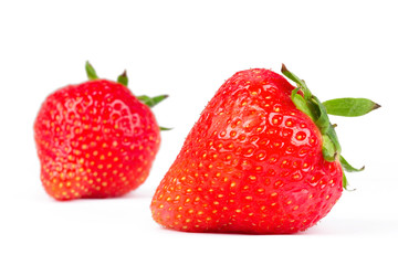 Two strawberries isolated on white