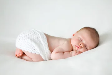 Fotobehang sleeping newborn baby © Ramona Heim