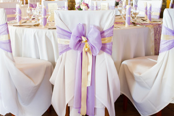 wedding chairs with ribbon, event place