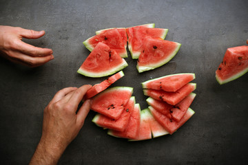 Eating watermelon slices