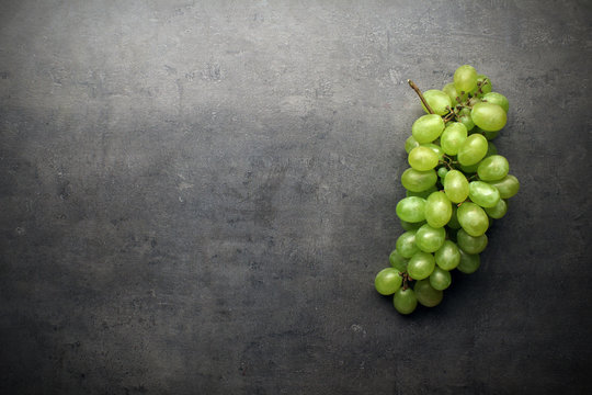 Bunch Of Grapes On Grey Kitchen Table