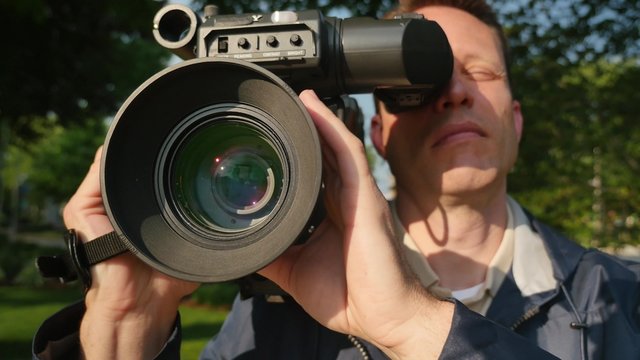 Cameraman with Camera Outside POV