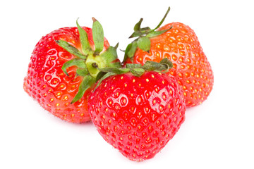 Three strawberries isolated on white