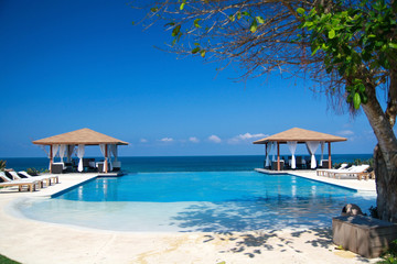 Two luxury summerhouses with swimming pool near ocean