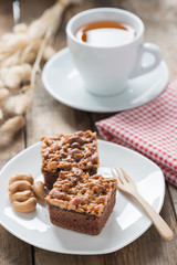 Toffee cake with tea cup.